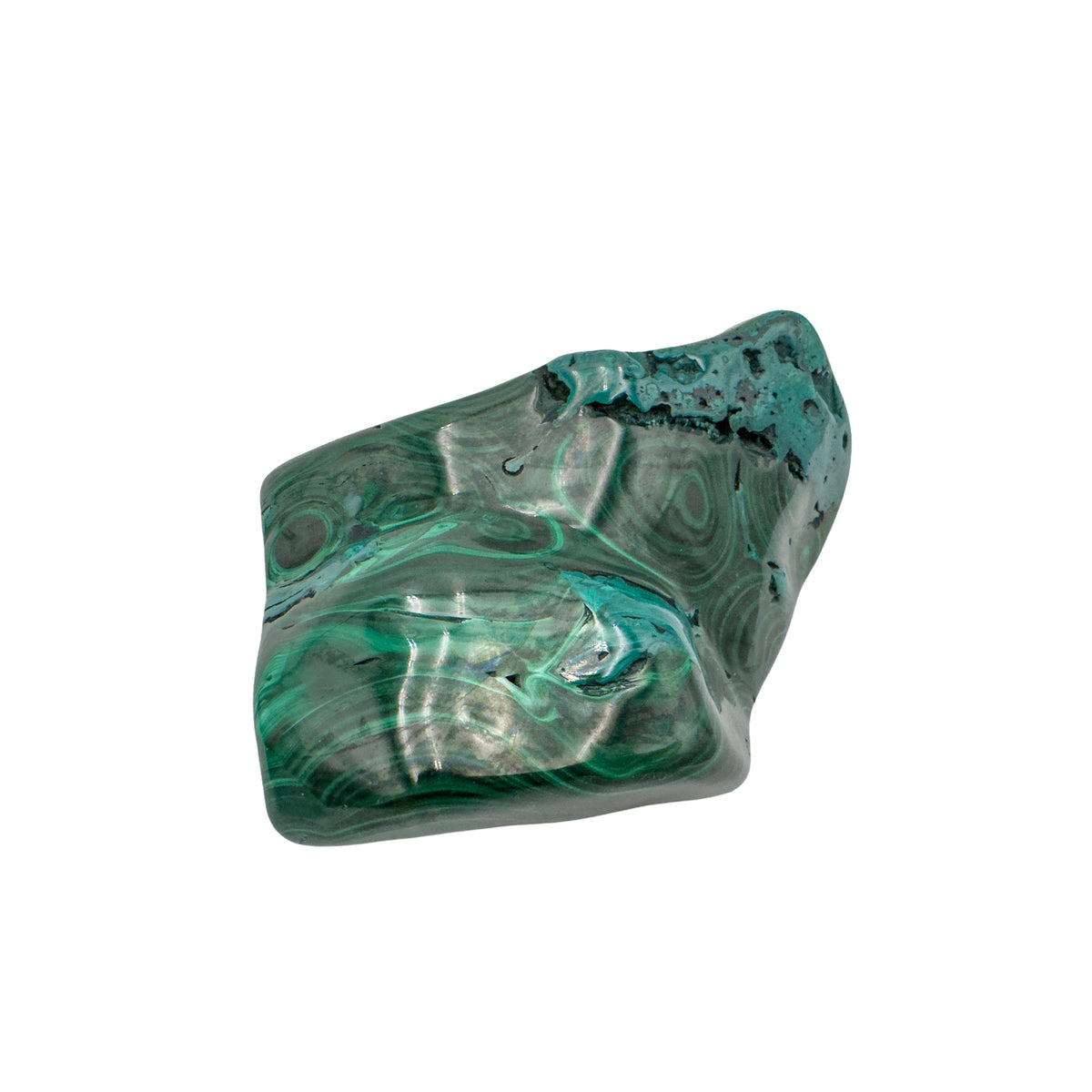 Wider angled view of the malachite specimen, showing concentric ring banding beside a raw patch at the upper left.