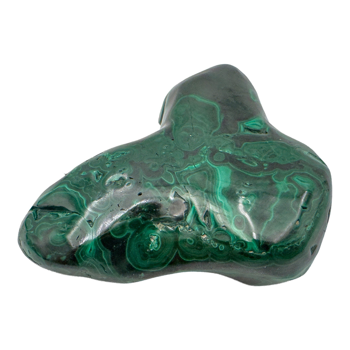 Low side angle of the malachite specimen, showing its horizontal profile and banding running along the base.