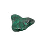 Mirrored front view of the malachite specimen, with banding wrapping around its irregular lobed form.