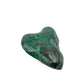 Side view of the malachite specimen turned to show the twist in its lobed silhouette.