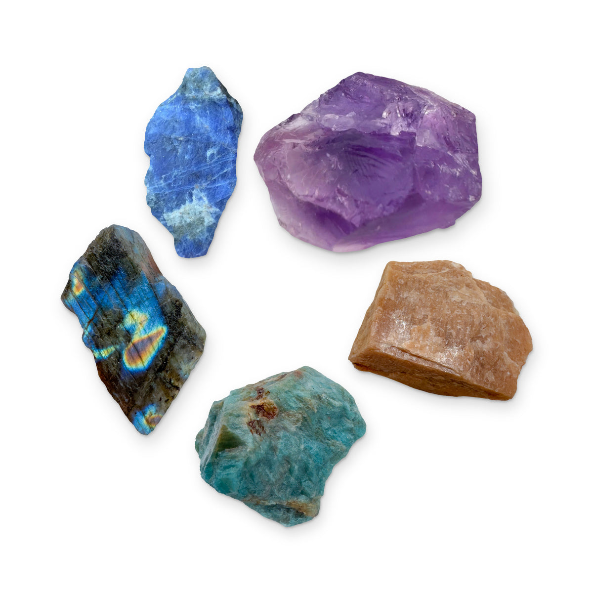 Moon & Intuition Crystal Kit: labradorite, sodalite, amethyst, peach moonstone and blue apatite, shown together on white