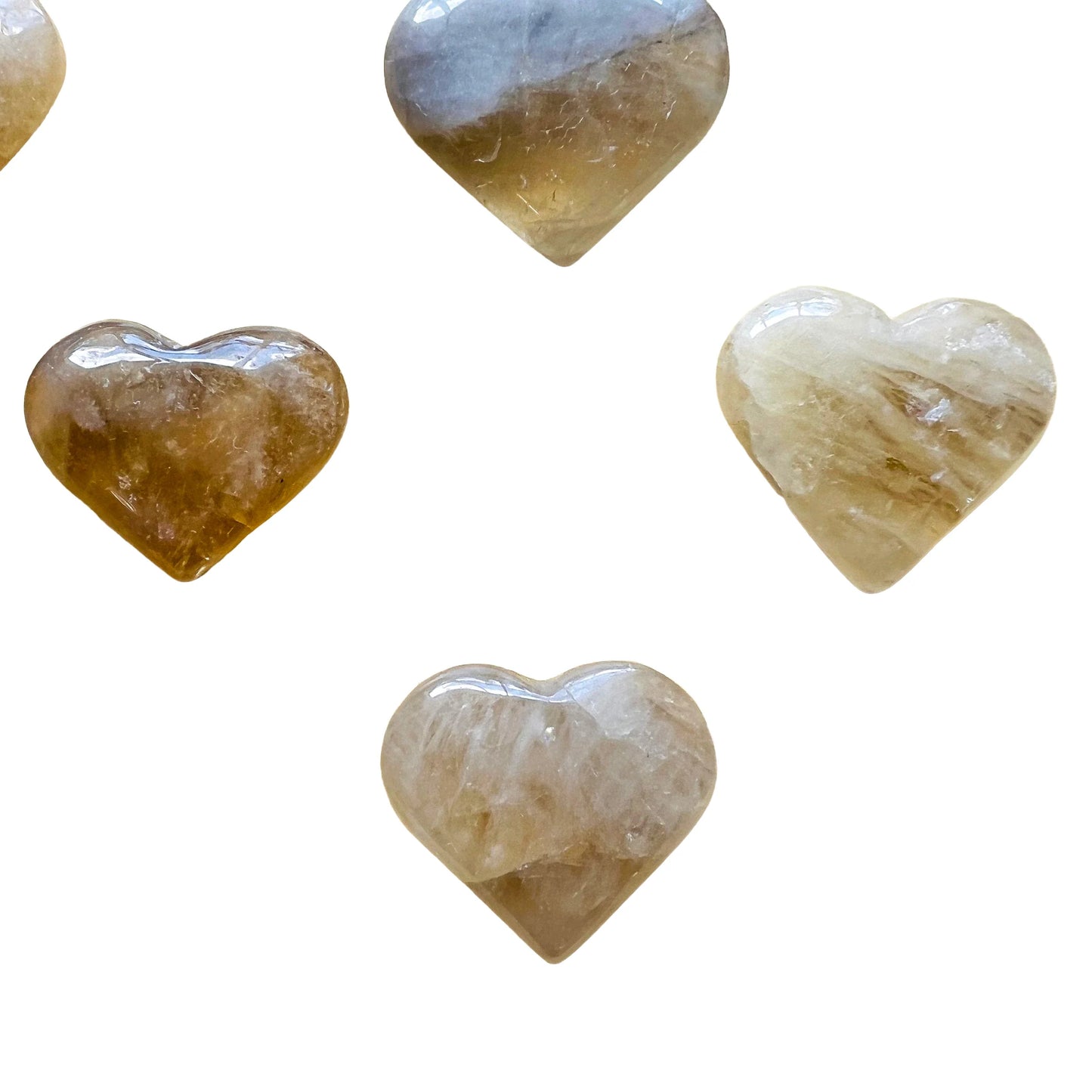 Edge view of Natural Citrine polished heart, turned to for Abundance and Manifestation.