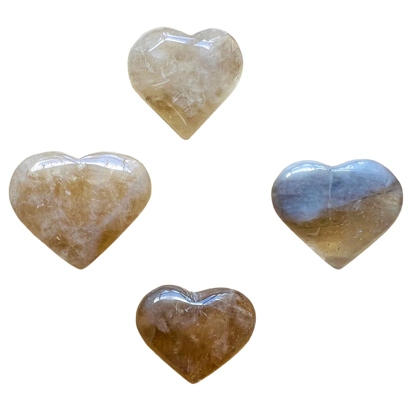 Overhead view of Natural Citrine polished heart, hand-selected from Brazil, showing color depth.