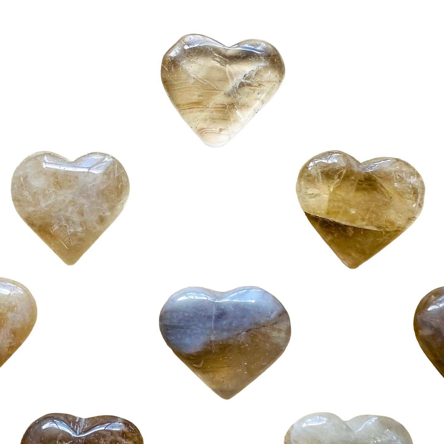 Alternate angle of Natural Citrine polished heart, drawn on for Abundance, sourced from Brazil.