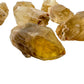Profile view of Natural Citrine raw stone, hand-selected from Haut-Lomami, Democratic Republic of the Congo, showing subtle.
