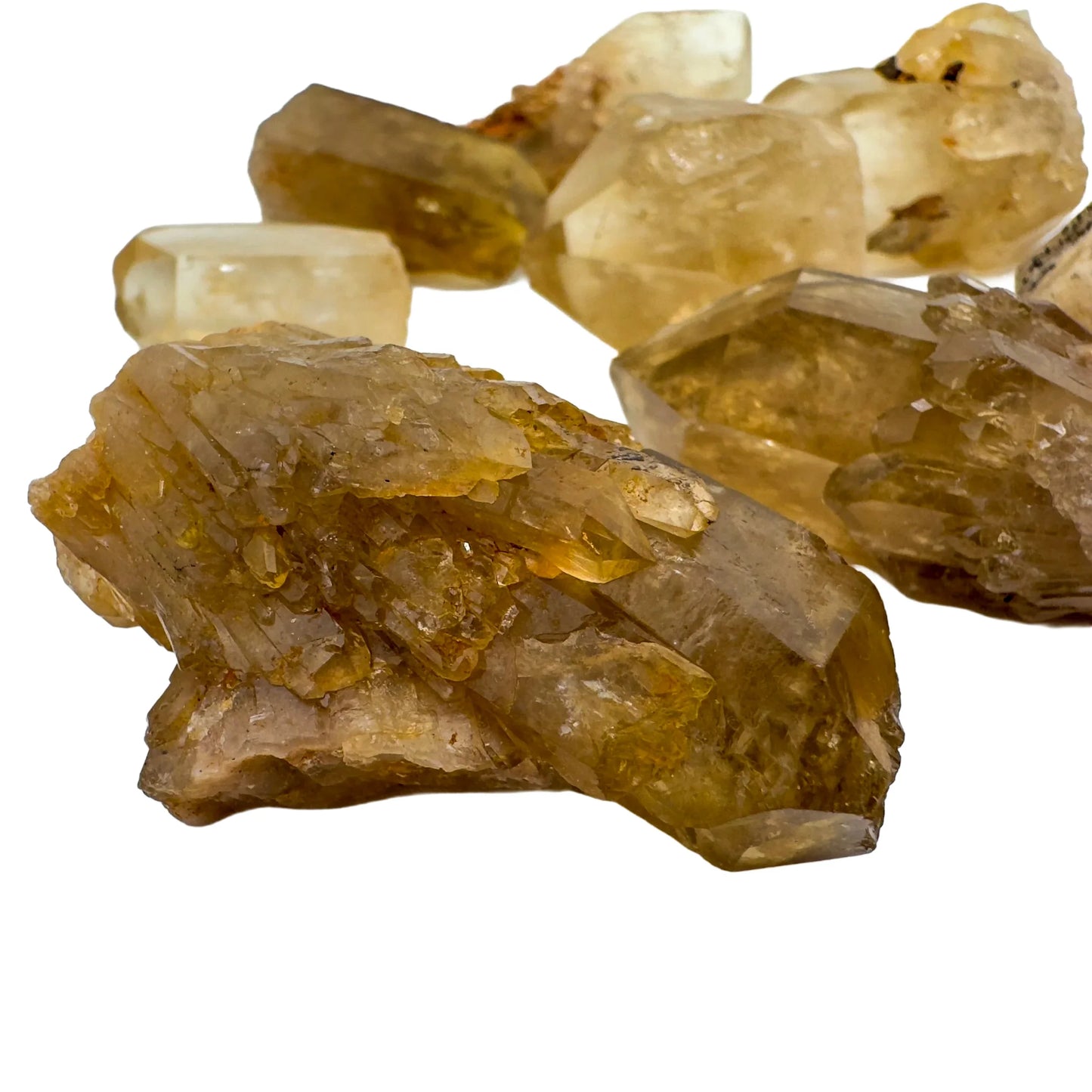Profile view of Natural Citrine raw stone, sourced from Democratic Republic of the Congo, showing honest grain.