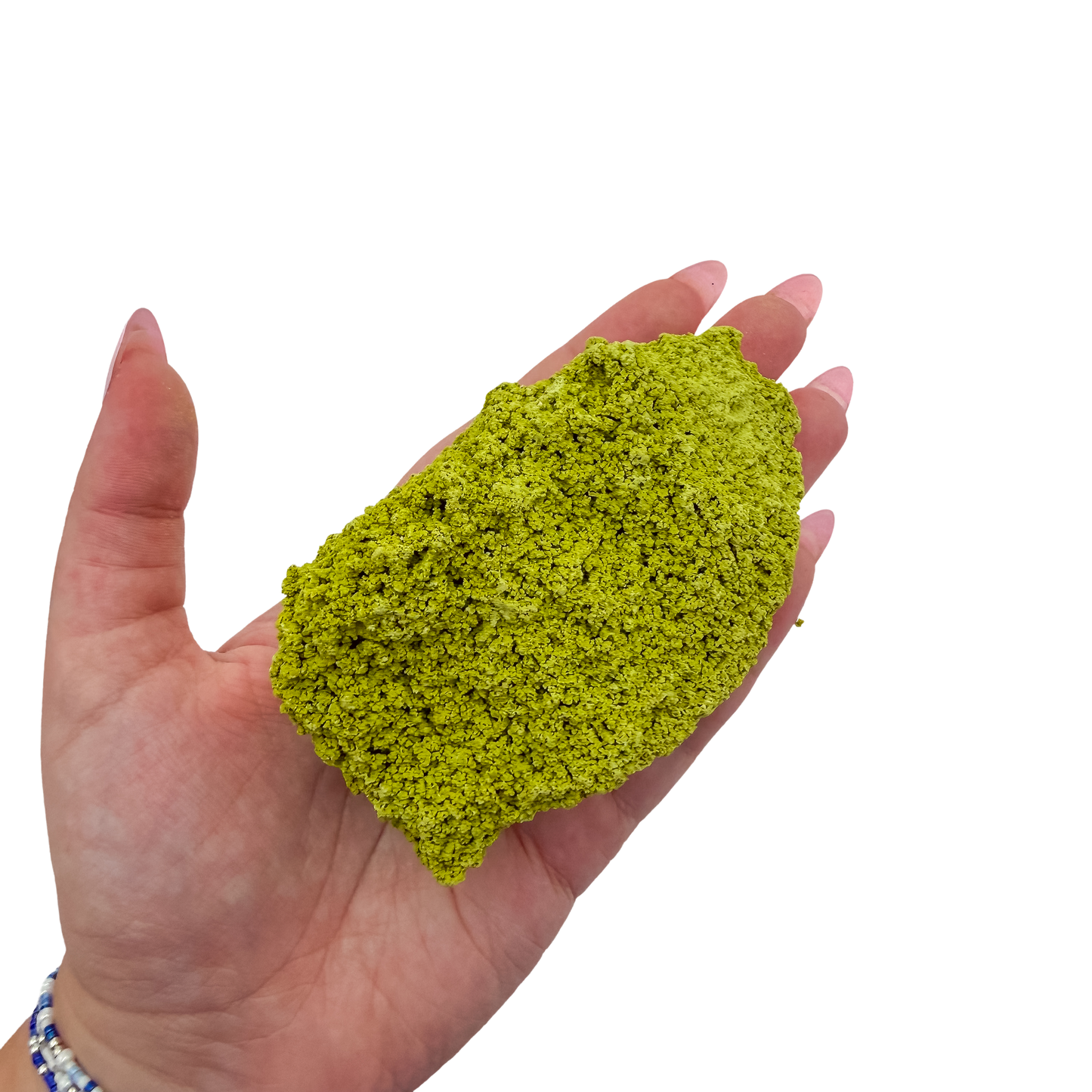 A hand holds nontronite no. 16 for scale, the 121 gram specimen spanning roughly 3.62 inches across the palm.