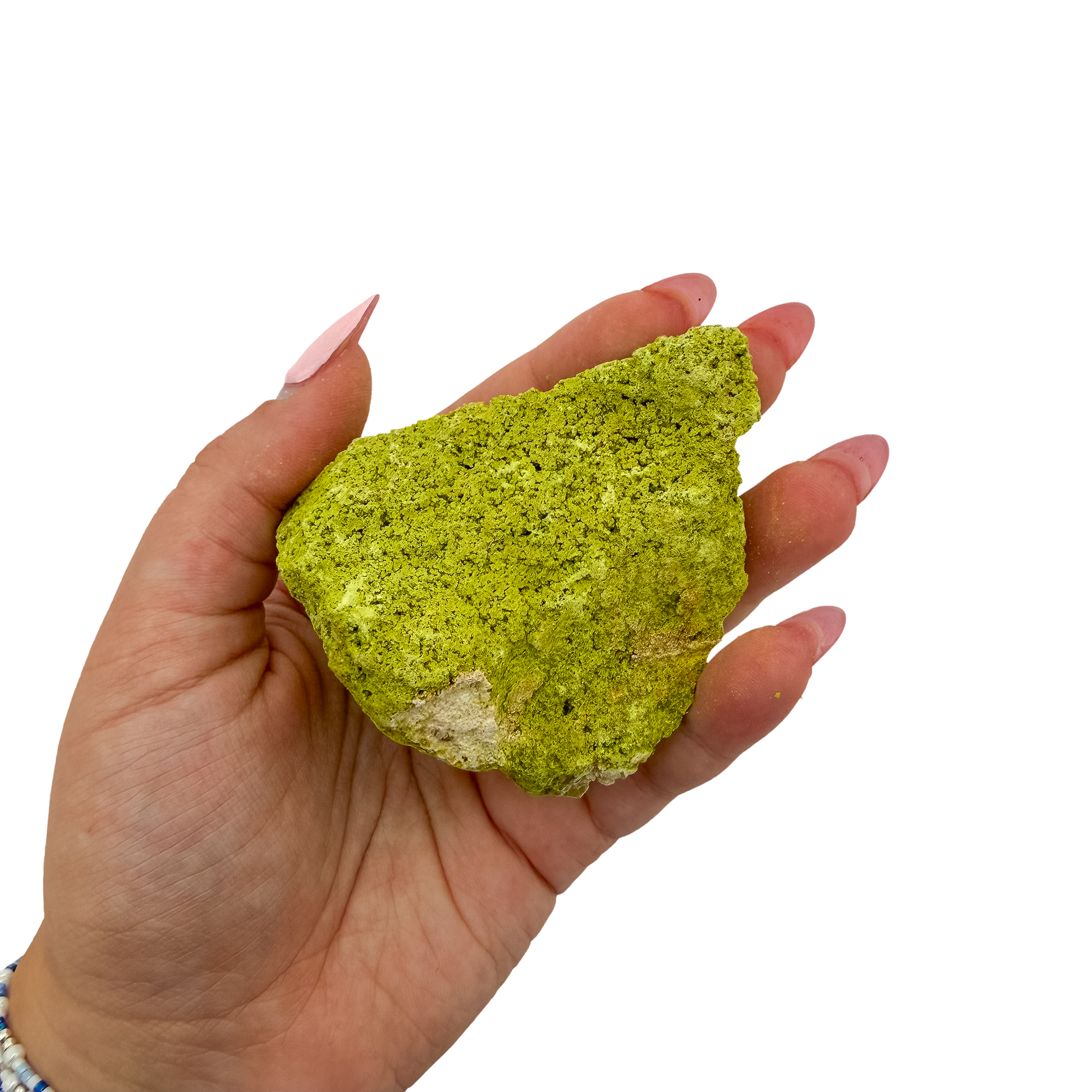 A hand holds nontronite no. 21 for scale, the 106 gram specimen spanning roughly 2.26 inches across the palm.