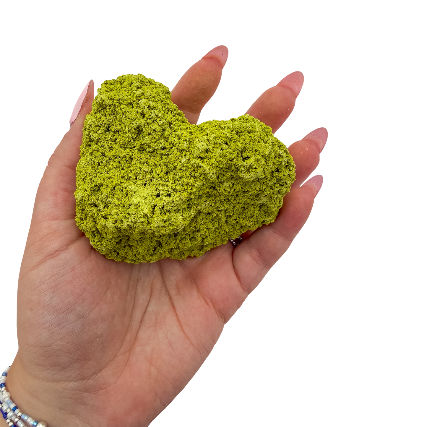 Scale reference for nontronite no. 27: the 2.88 by 2.63 inch specimen resting in an open hand.
