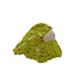 The left profile of nontronite no. 28, a 1.59 inch tall piece whose yellow-green surface reads as clustered bubbles.