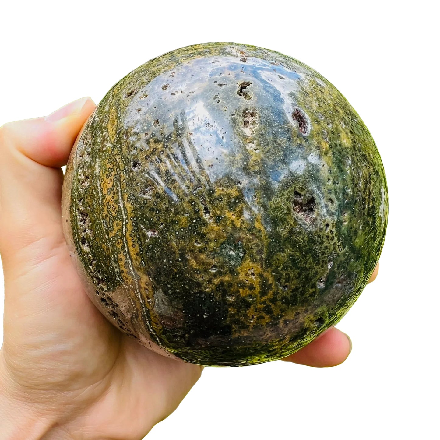 Color detail of green Ocean Jasper polished sphere, showing subtle veining, sourced from Sofia, Madagascar.