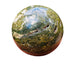 Styled with natural light Ocean Jasper stone, from Sofia, Madagascar, shown for proportion against the hand.