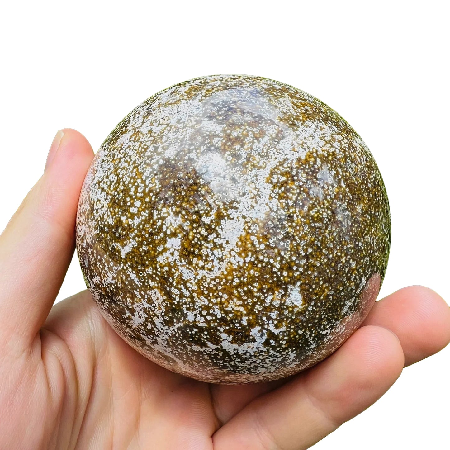 Rear view of Ocean Jasper polished sphere, showing characteristic color.