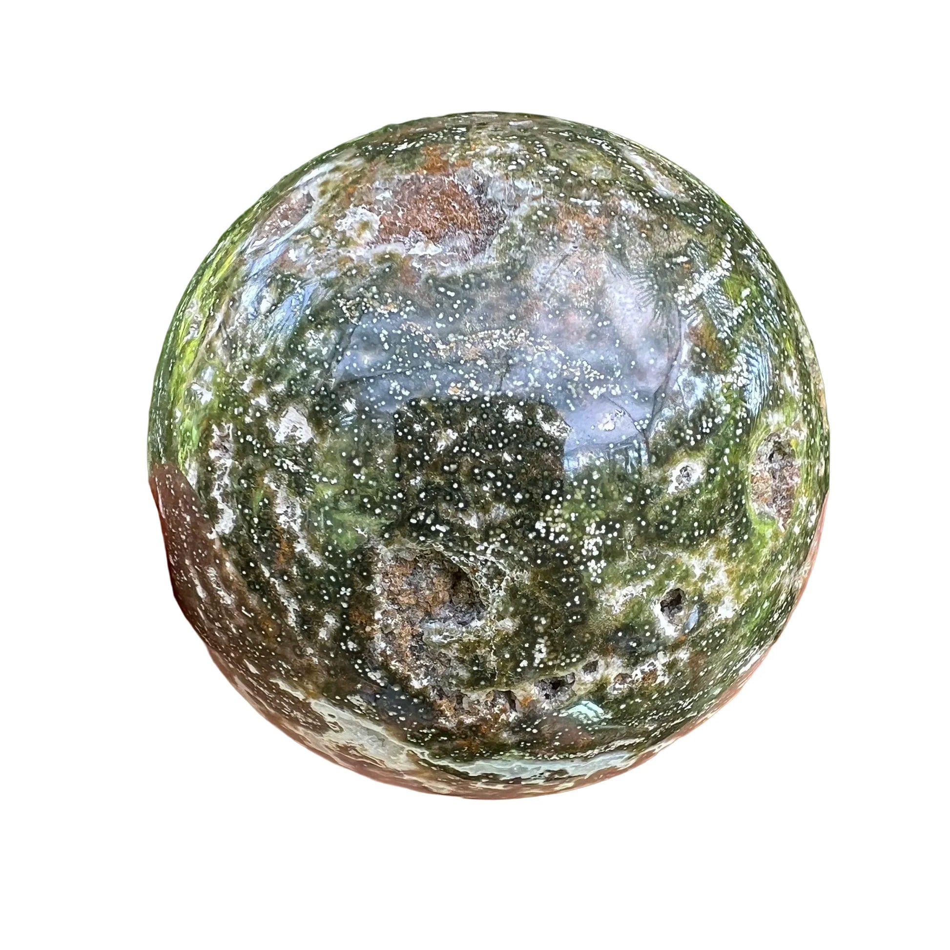 Scale reference of one Ocean Jasper polished sphere for scale, sourced from Sofia, Madagascar.