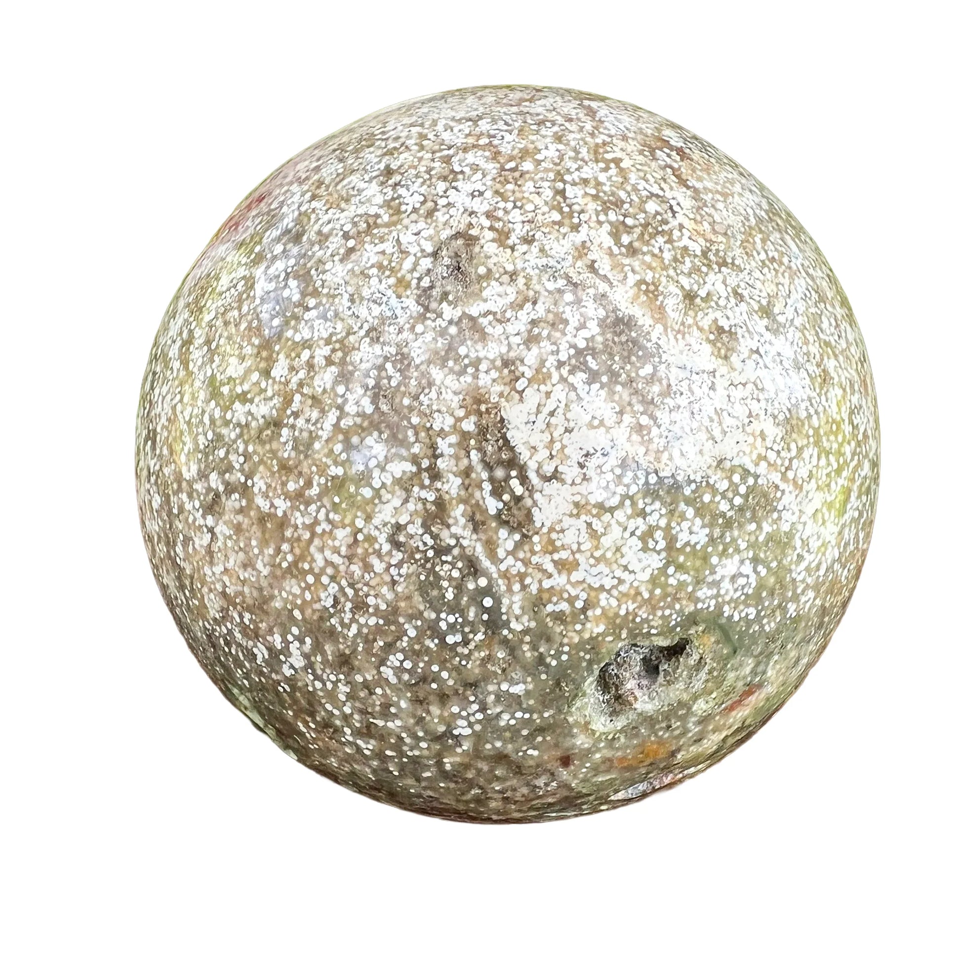 Edge view of Ocean Jasper polished sphere, showing subtle veining, hand-selected from Sofia, Madagascar.