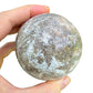 Back view of Grade AA Ocean Jasper sphere showing natural surface