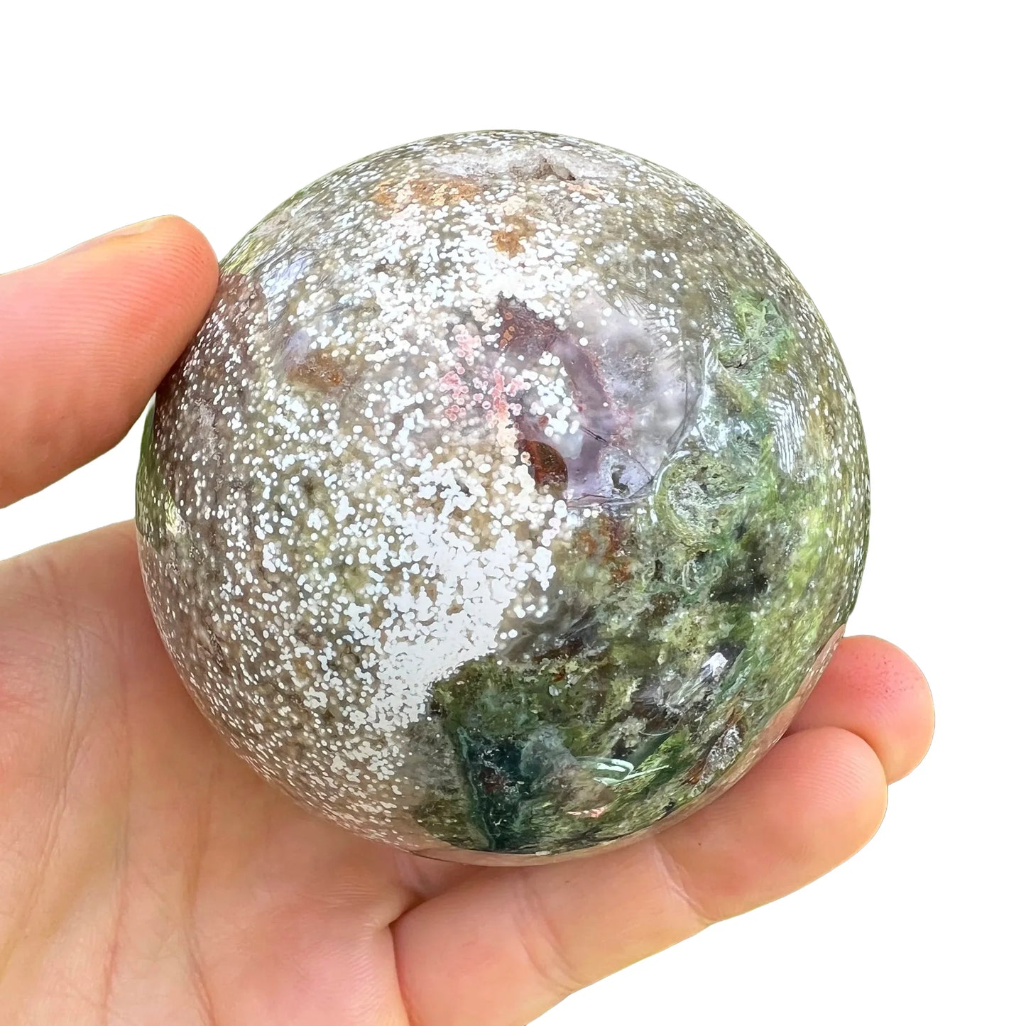 Detail shot of Grade AA Ocean Jasper sphere under natural light
