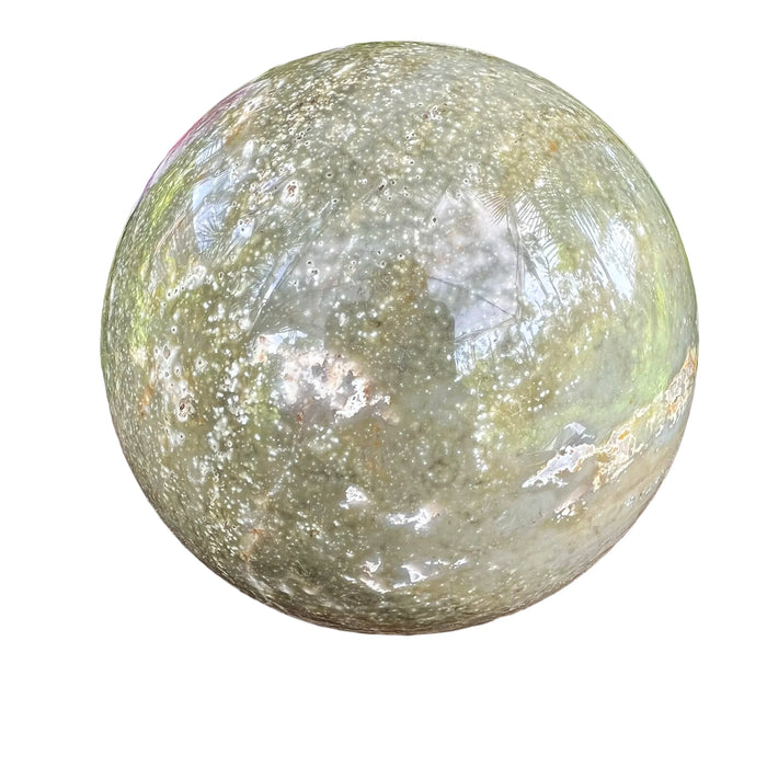 Bottom side of Grade AA Ocean Jasper polished sphere, from Sofia, Madagascar, showing natural texture.