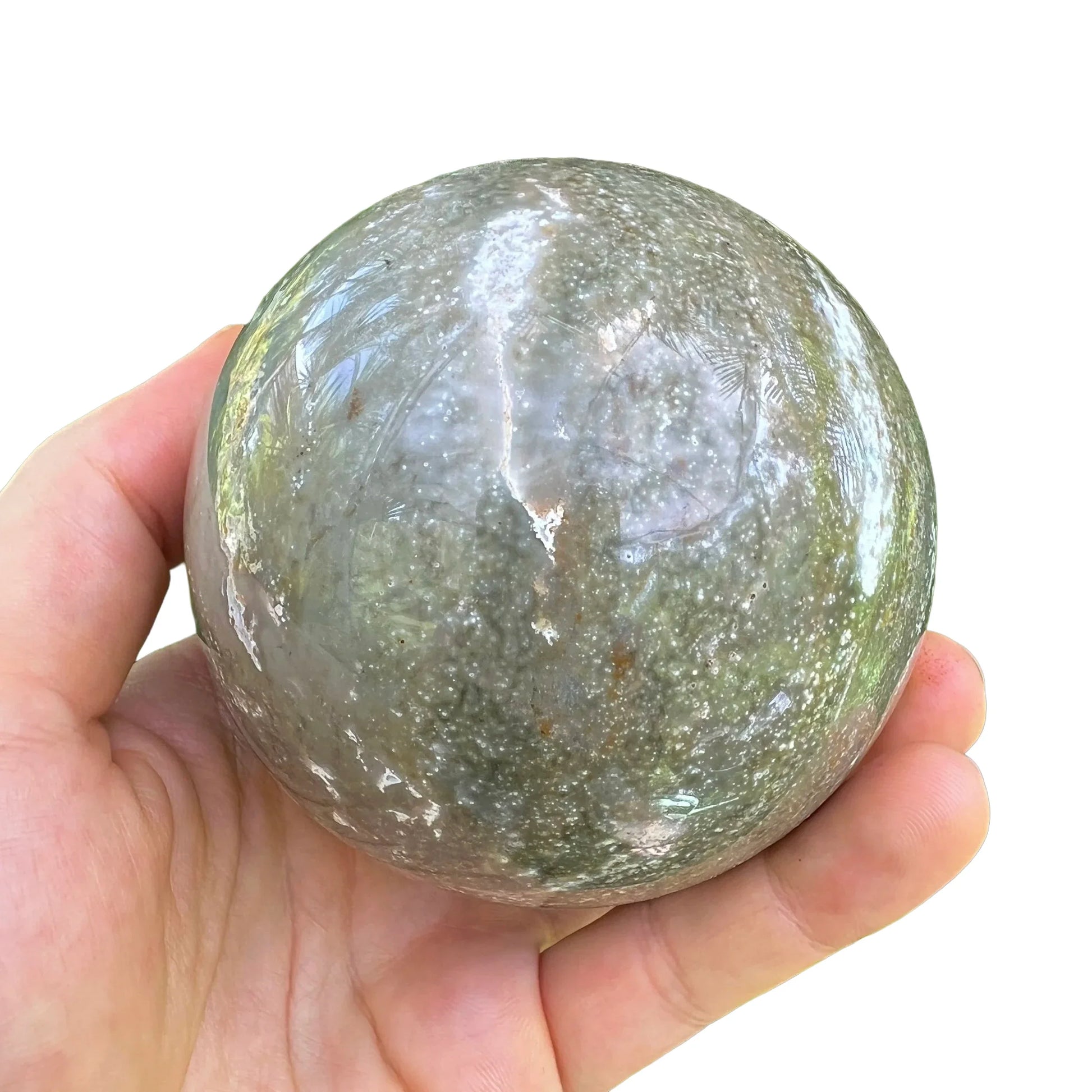 Size comparison with one Ocean Jasper polished sphere for scale, Madagascar-sourced, from Sofia, Madagascar.