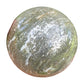 Detail shot of Grade AA Ocean Jasper sphere under natural light