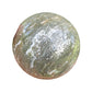 Detail shot of Grade AA Ocean Jasper sphere under natural light