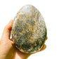 Palm-scale view of a single Ocean Jasper freeform from Sofia, Madagascar.