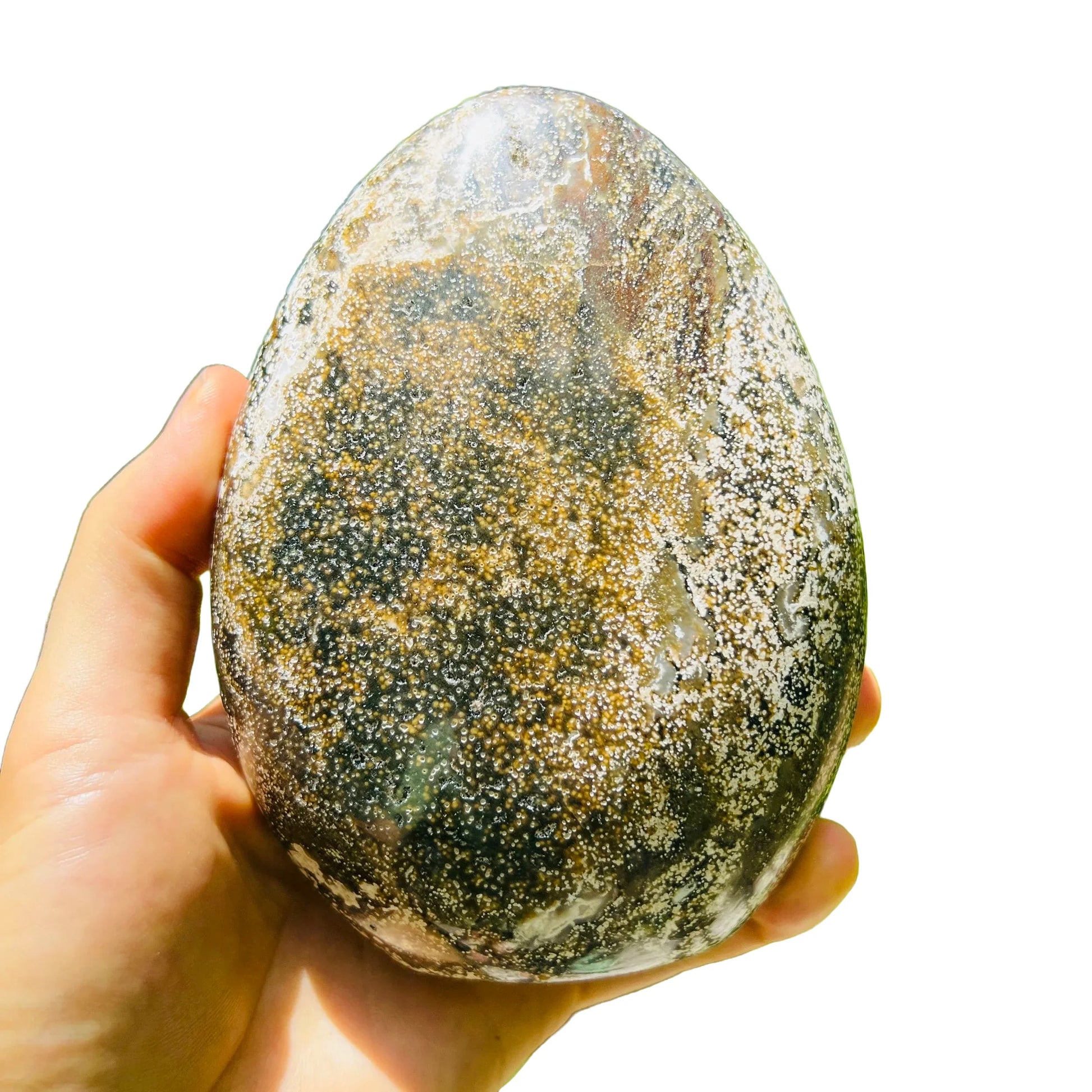 Palm-scale view of a single Ocean Jasper freeform from Sofia, Madagascar.