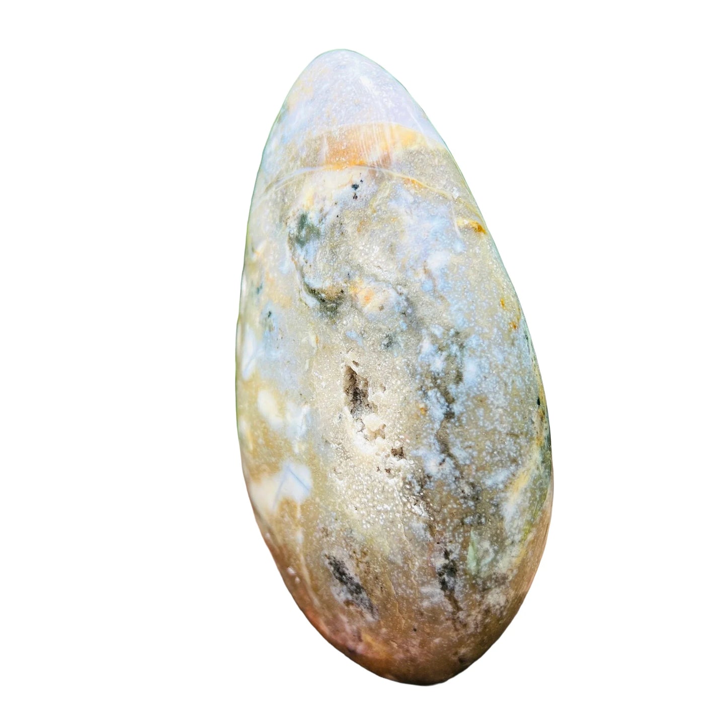 Side profile of Grade A Ocean Jasper freeform, sourced from Sofia, Madagascar, showing characteristic color.