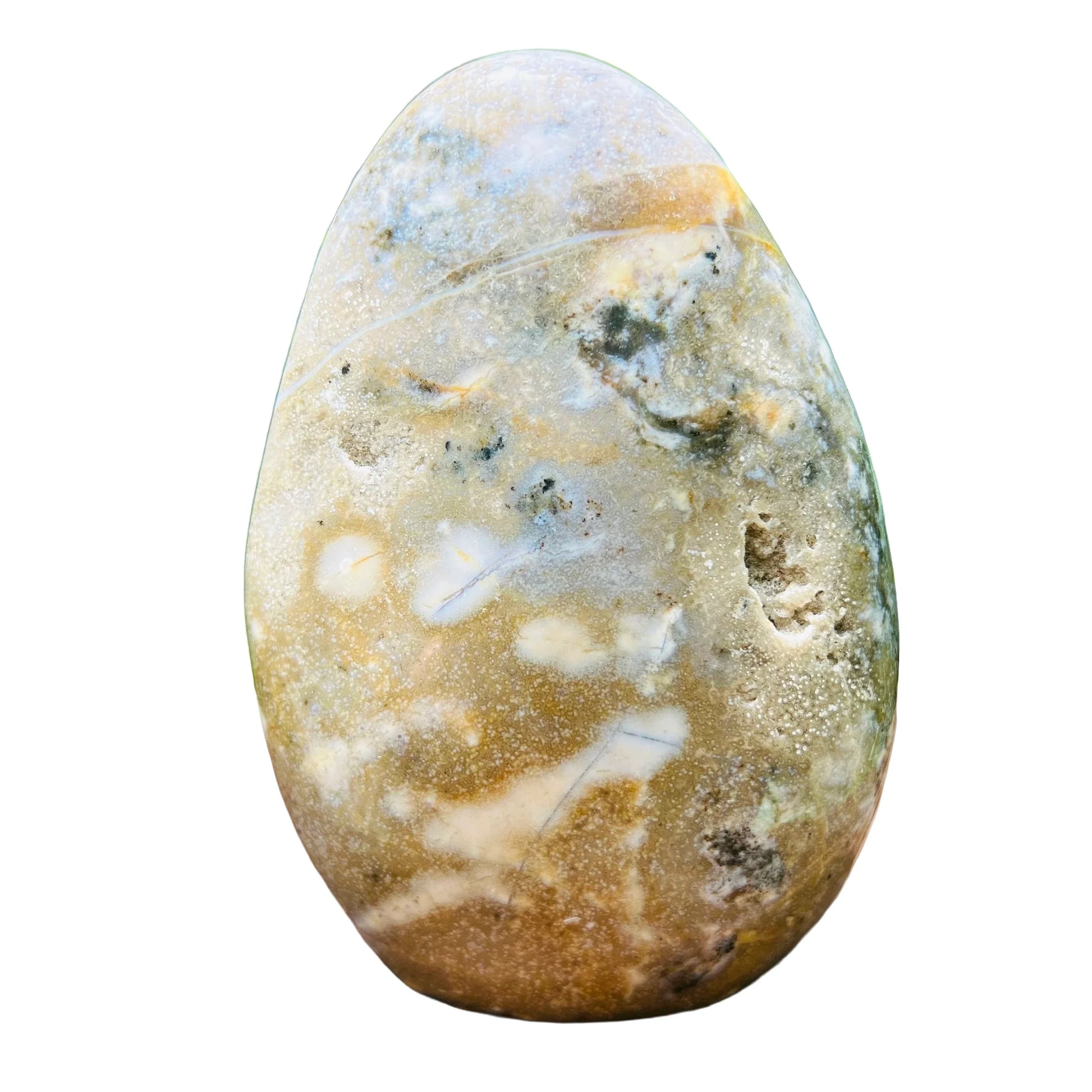 Top angle of green Ocean Jasper freeform, showing earthy tone, Madagascar-sourced.