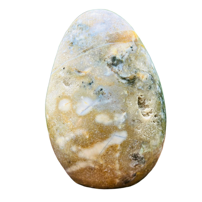 Top angle of green Ocean Jasper freeform, showing earthy tone, Madagascar-sourced.
