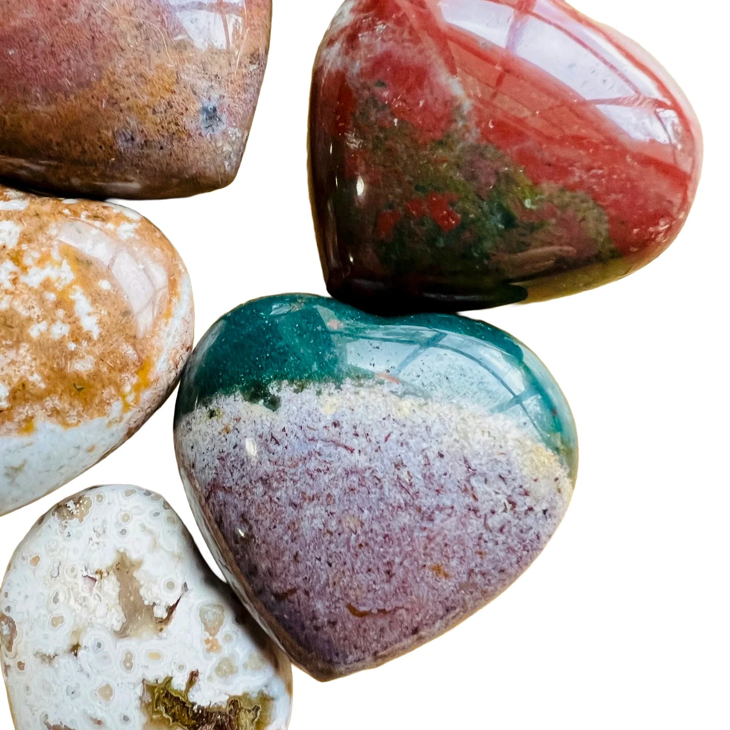 Looking down on Ocean Jasper polished heart, worked with for Emotional Healing and Stress Relief, sourced from Madagascar.