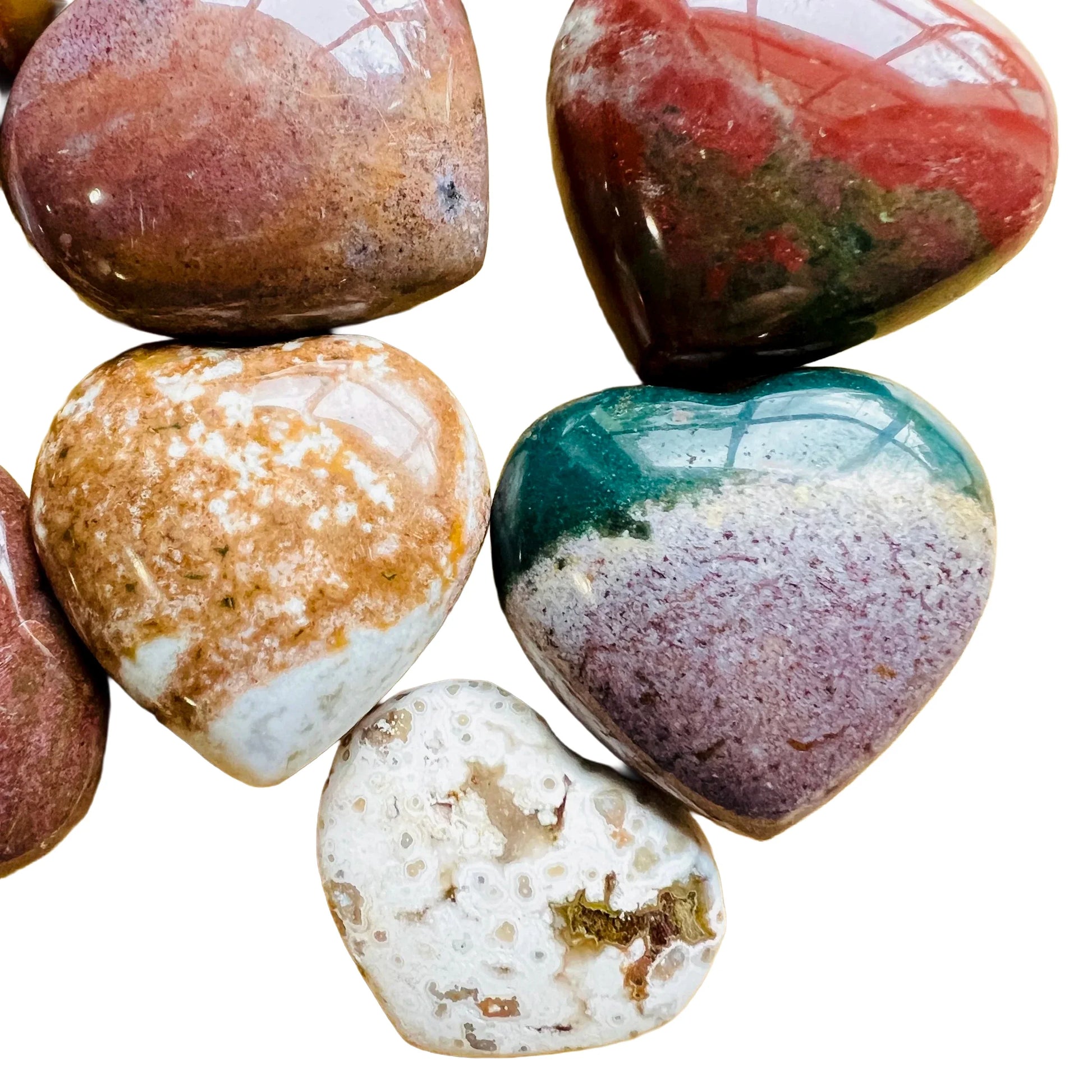 Companion image of Ocean Jasper stone, from Sofia, Madagascar, shown at hand scale.