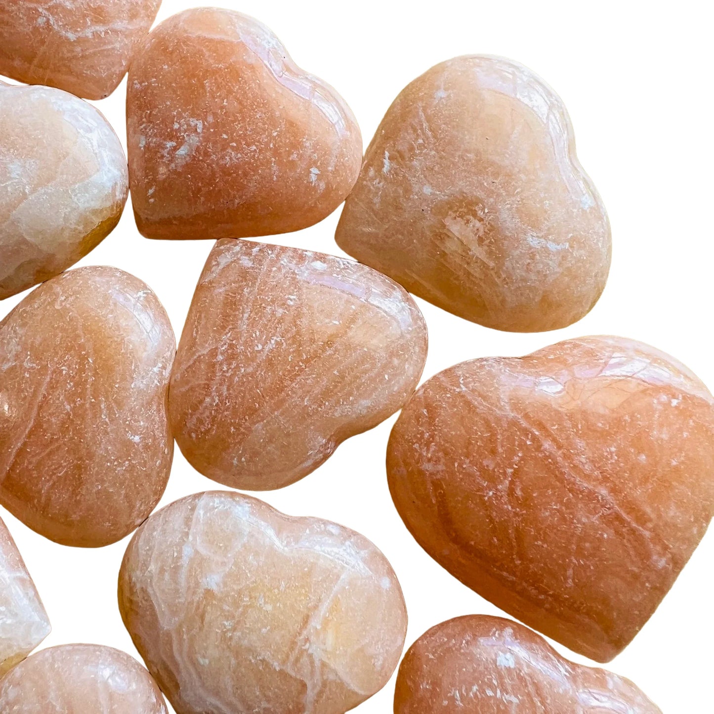 Bird's-eye view of Orange Calcite polished heart, showing earthy tone, sourced from Mahajanga, Madagascar.