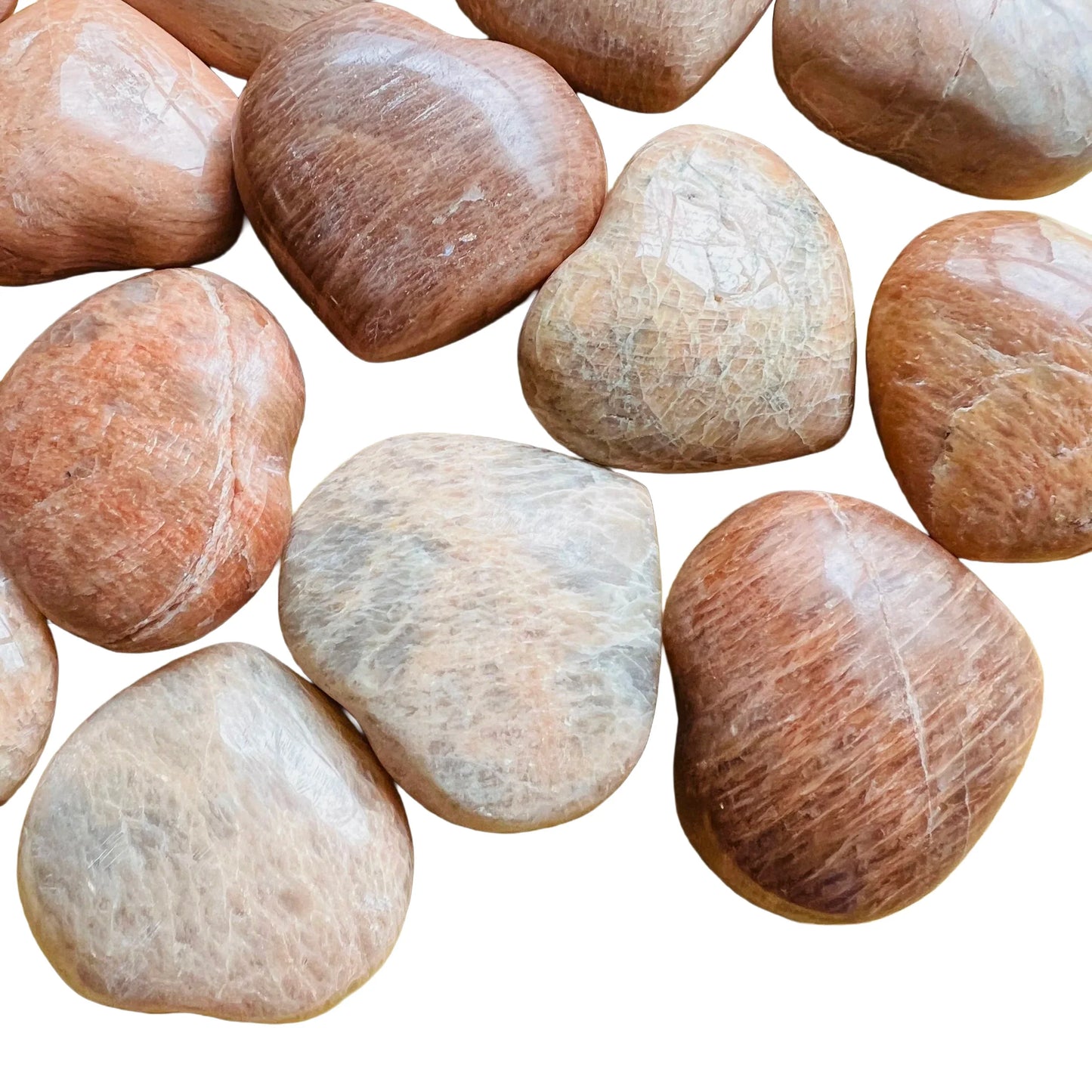 Top view of Peach Moonstone polished heart, from Alaotra-Mangoro, Madagascar, showing translucent edges.