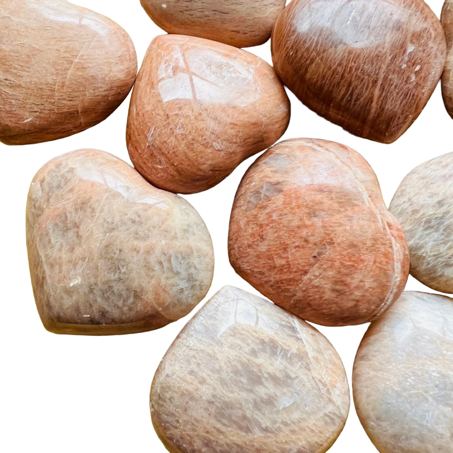 Reverse angle of Grade AA Peach Moonstone polished heart, showing natural variation.