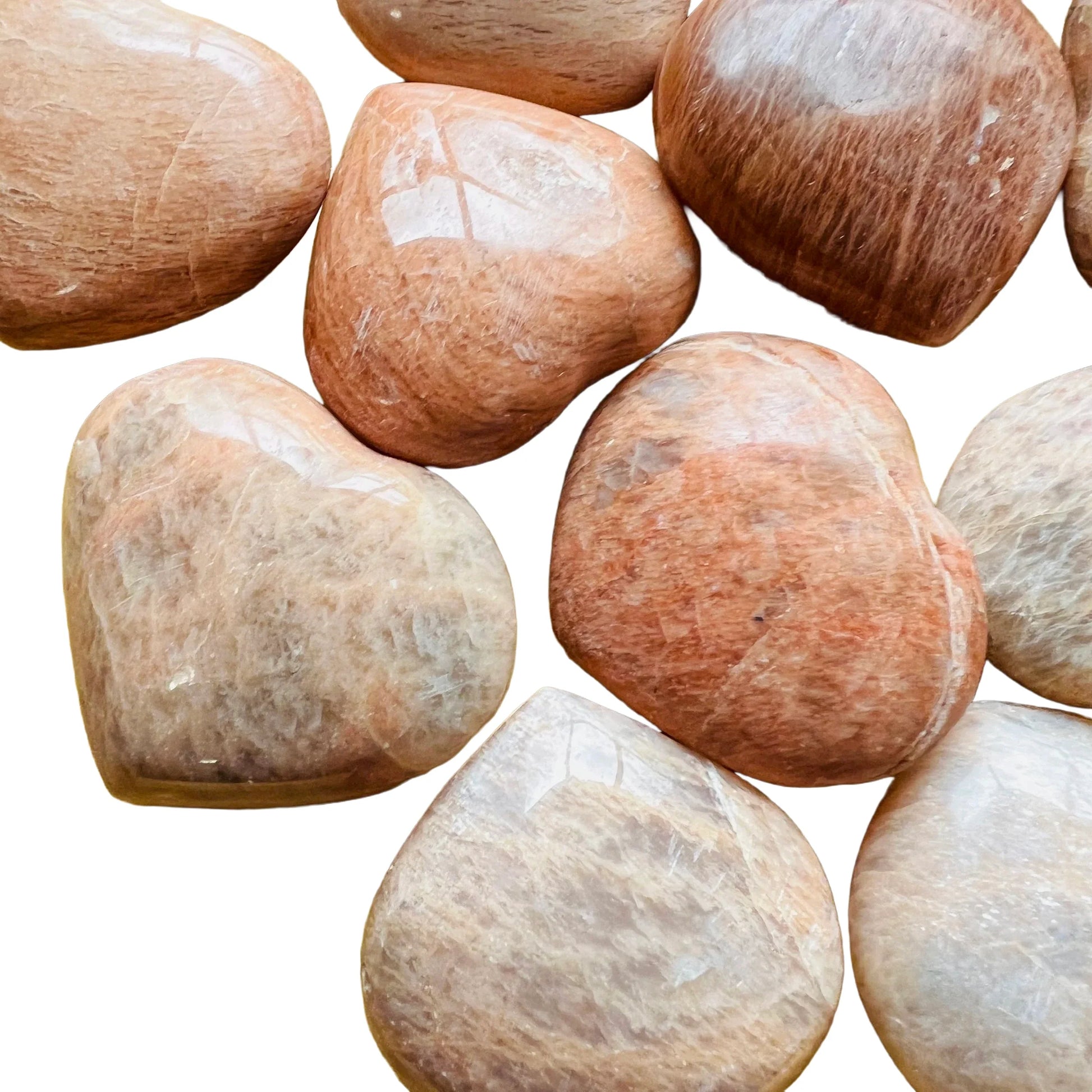 Reverse angle of Grade AA Peach Moonstone polished heart, showing natural variation.