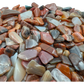 Petrified wood crystal chips product shot, Grade A Madagascar material showing quantity and texture