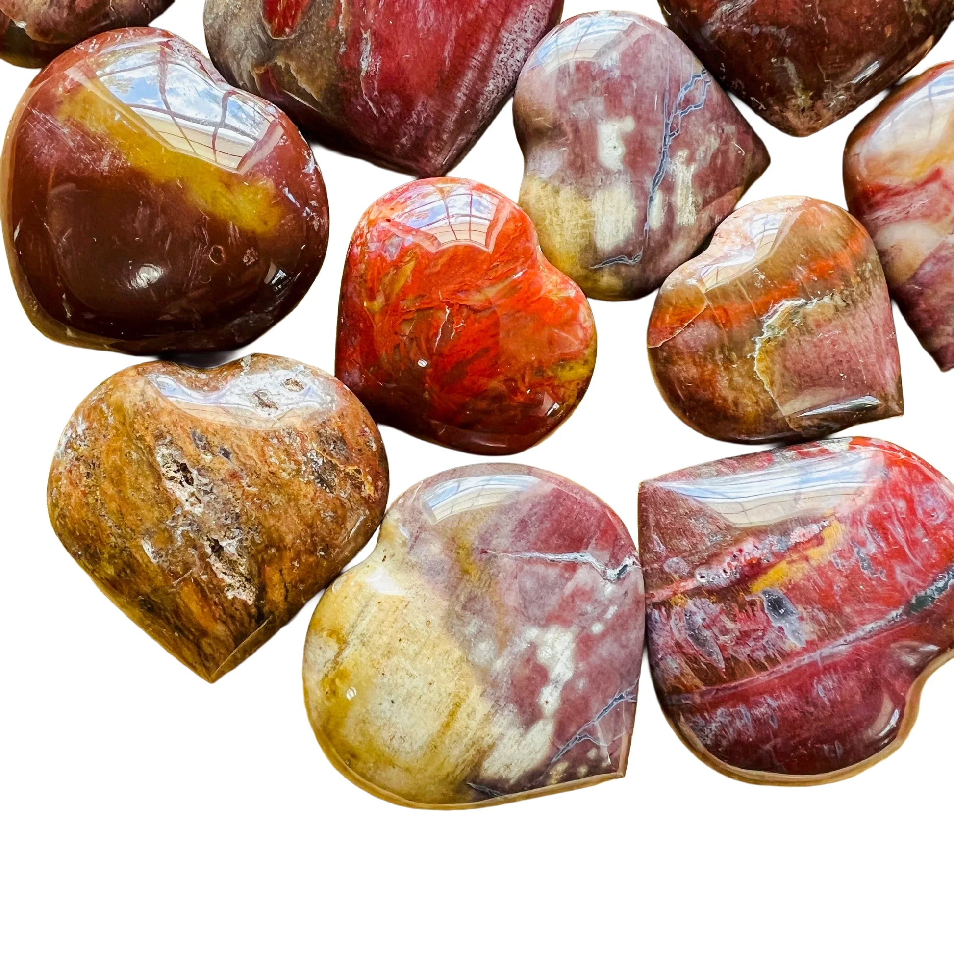 Tight crop of Petrified Wood polished heart, showing color depth.
