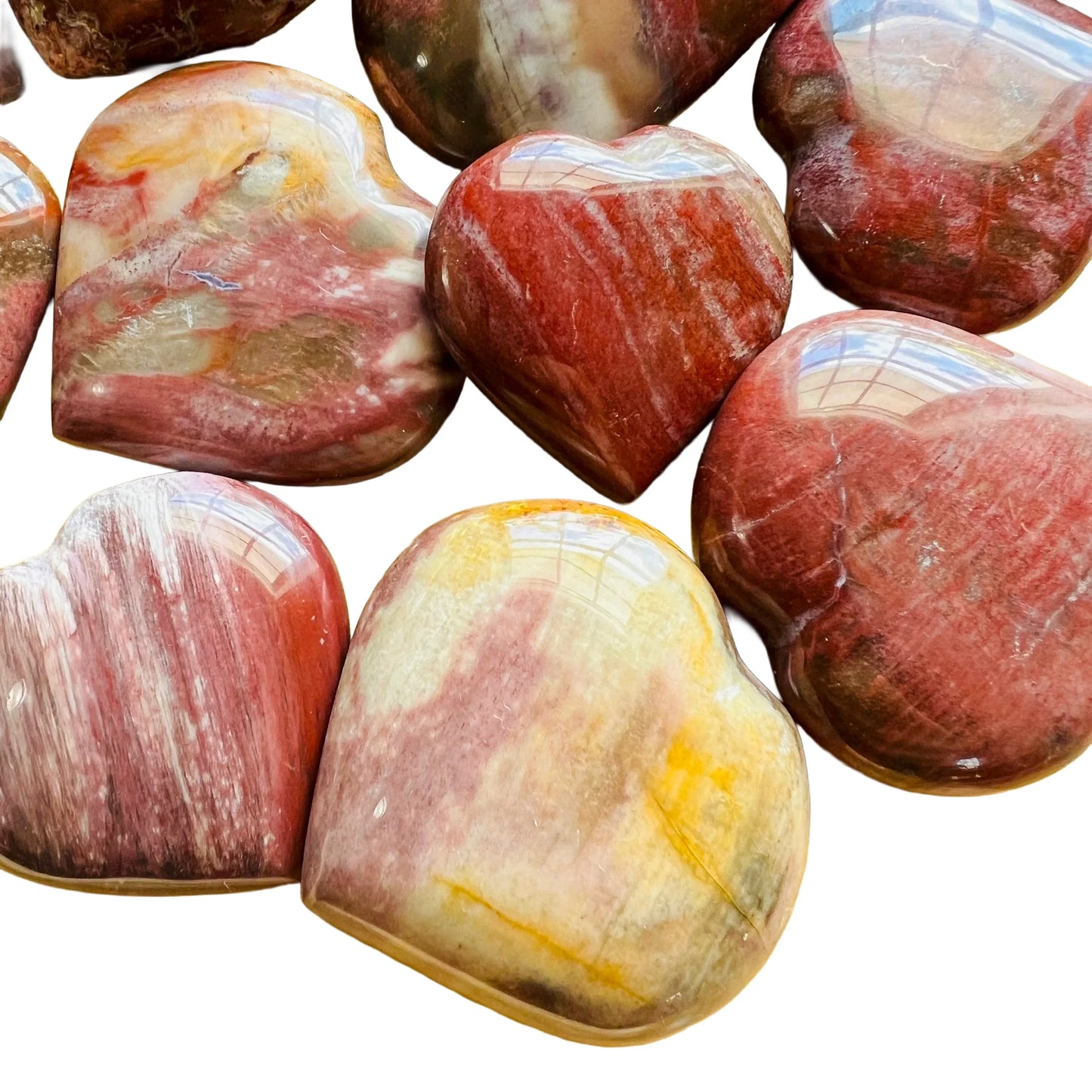 Top view of Petrified Wood polished heart, for Grounding and Protection, from Boeny, Madagascar.