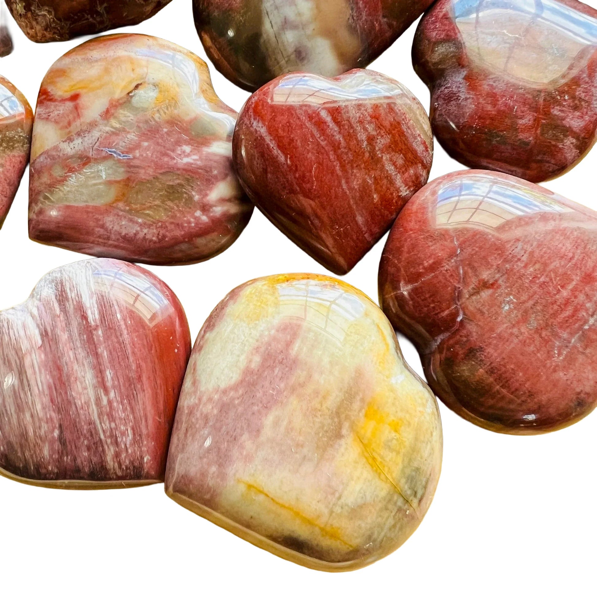 Top view of Petrified Wood polished heart, for Grounding and Protection, from Boeny, Madagascar.