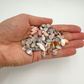 Pink agate chips product shot showing quantity and translucency, Grade A Botswana material