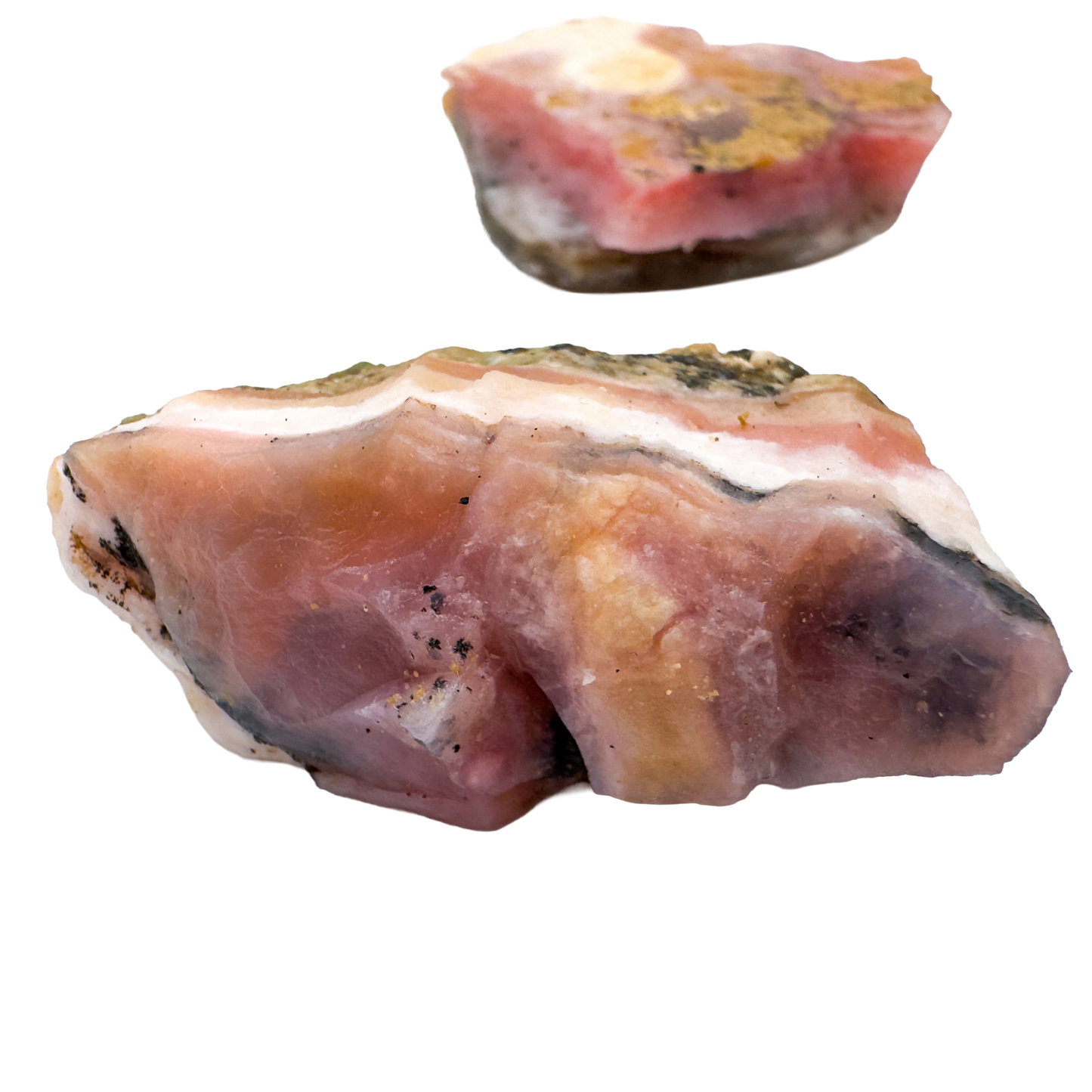 Pink Opal rough crystals showing soft pink color and natural matrix, ethically sourced from Peru by Beyond Bohemian