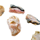 Variety of Pink Opal raw crystals (Grade A, Peru) showing range of pink tones for self love and heart-centered work