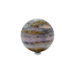 The left profile of this 467 gram pink opal sphere, showing the mirror finish across 74.7 millimeters of stone.