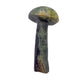 Top-down view of the serpentine mushroom cap, mottled green surface polished smooth by hand.