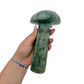 Serpentine mushroom no. 1 held in an open hand, showing the true scale of this 7.04 inch, 2.30 pound carving.
