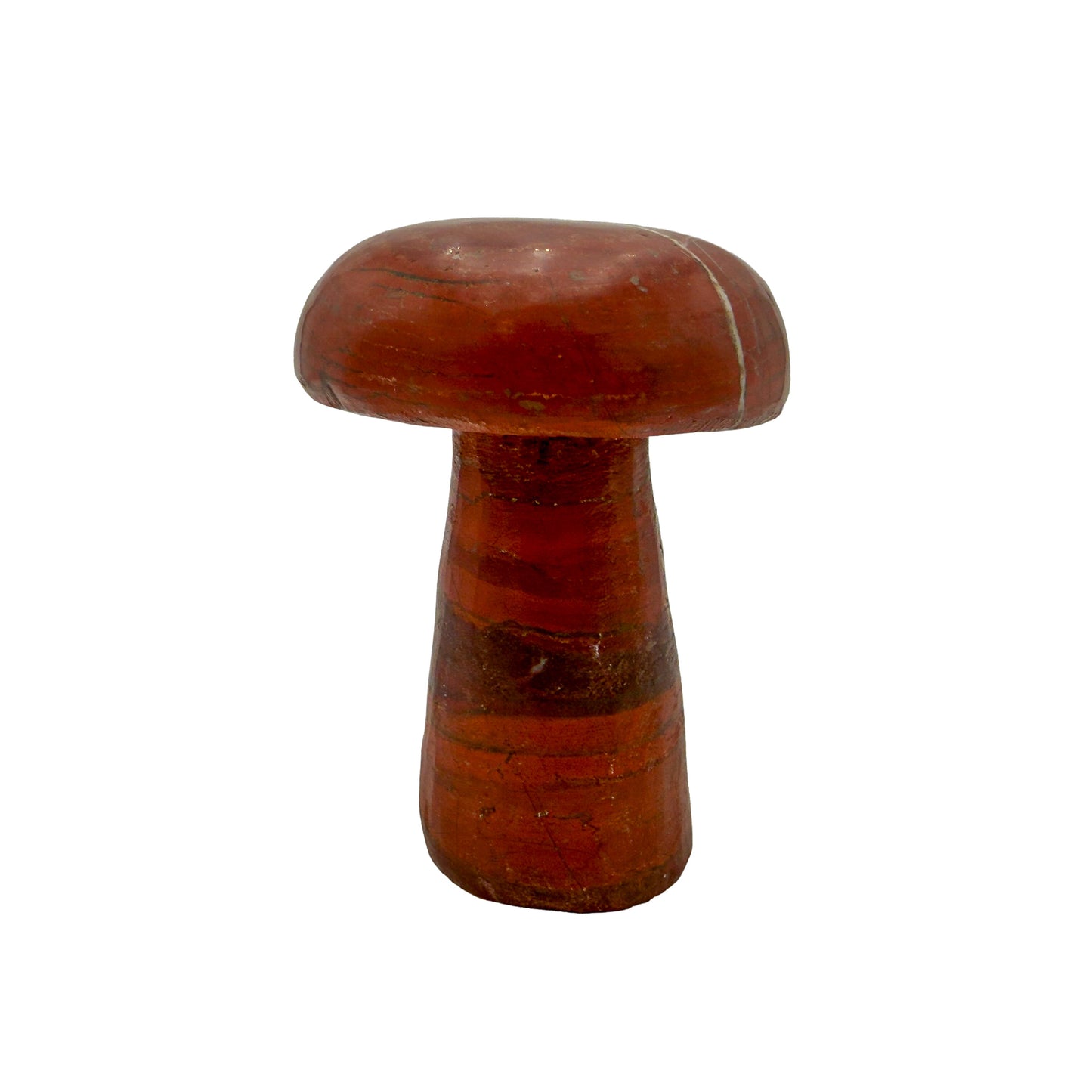 Left profile of red jasper mushroom no. 3, wide 3.32 inch cap sitting low over a short stem.
