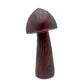Angled view of a 2.76 pound tiger iron mushroom carving, folded bands of jasper and hematite running up the stem.
