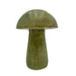 Right profile of a hand-carved serpentine mushroom, pale sage through deeper olive with dark inclusions.