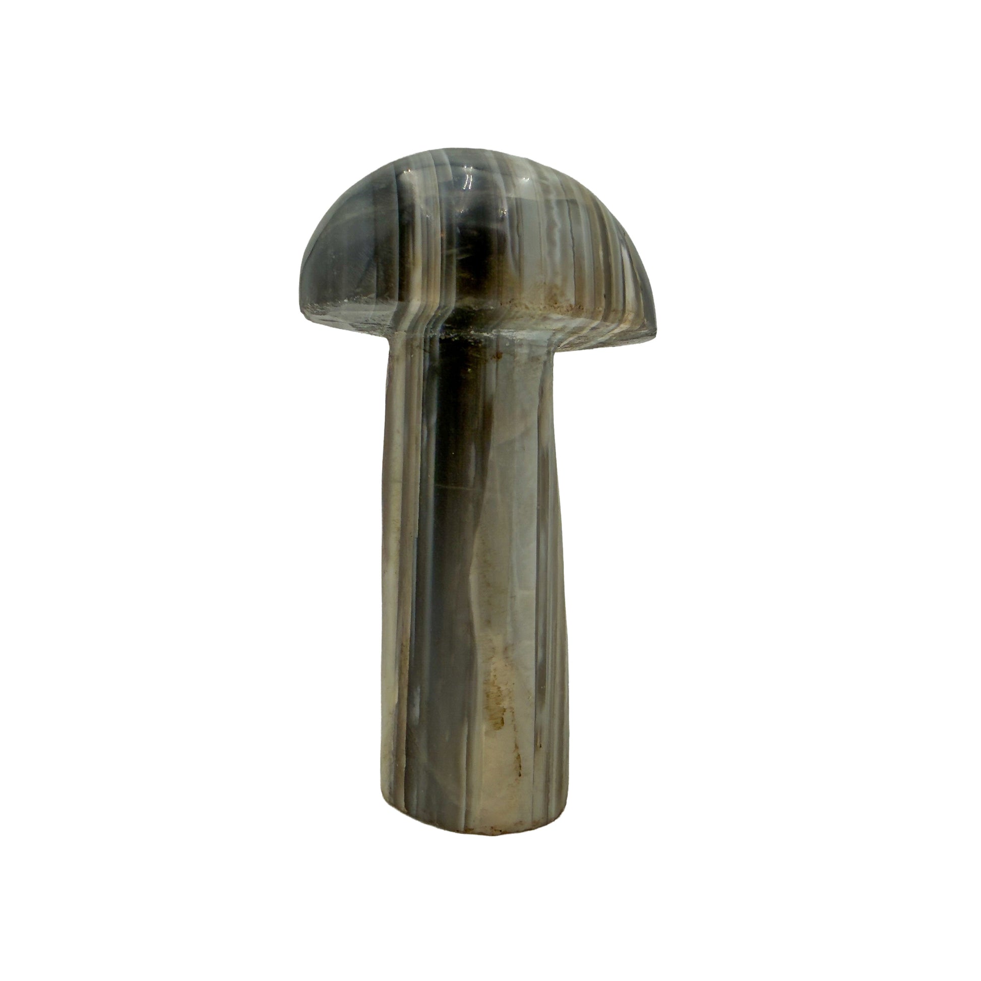 Right profile of a hand-carved agate mushroom, near-black bands alternating with pale cream.